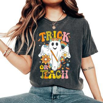 Halloween Trick Or Teach Groovy Retro Ghost Floral Teacher Women's Oversized Comfort T-Shirt - Thegiftio UK