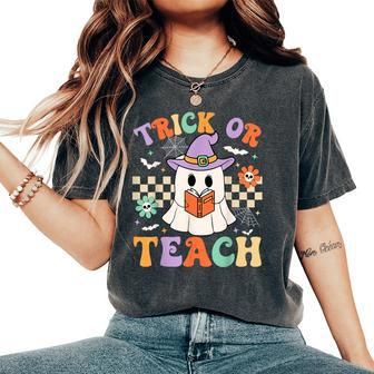 Trick Or Teach Groovy Teacher Halloween Retro Floral Ghost Women's Oversized Comfort T-Shirt - Seseable