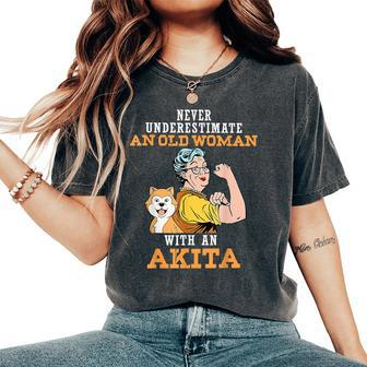 Never Underestimate An Old Woman With An Akita Women's Oversized Comfort T-Shirt | Mazezy