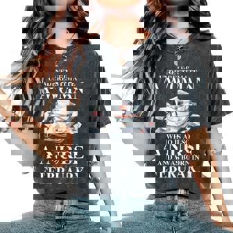 Never Underestimate A Woman Who Is Also A Nurse In February Women's Oversized Comfort T-Shirt | Mazezy