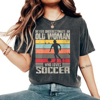 Vintage Never Underestimate An Old Woman Who Loves Soccer Women's Oversized Comfort T-Shirt - Seseable