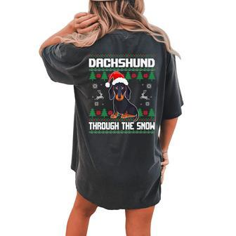 Dachshund Dog Through The Snow Ugly Christmas Sweater Women's Oversized Comfort T-shirt Back Print - Monsterry DE