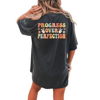 Back To School Progress Over Perfection Teacher Groovy Women's Oversized Comfort T-shirt Back Print | Mazezy