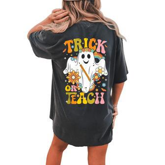 Halloween Trick Or Teach Groovy Retro Ghost Floral Teacher Women's Oversized Comfort T-shirt Back Print - Thegiftio UK