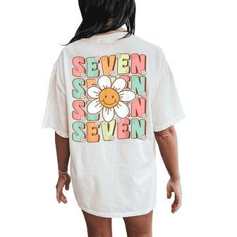 Cute Groovy 7Th Birthday Party Daisy Flower Seven Year Old Women's Oversized Comfort T-Shirt Back Print - Monsterry AU