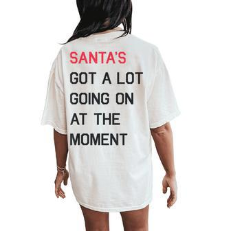 Santa's Got A Lot Going On At The Moment Christmas Holiday Women's Oversized Comfort T-Shirt Back Print - Monsterry