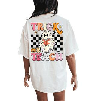 Trick Or Teach Groovy Halloween Retro Floral Ghost Teacher Women's Oversized Comfort T-Shirt Back Print | Mazezy