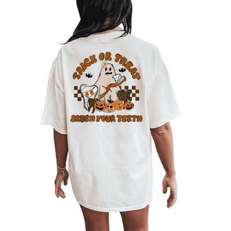 Trick Or Treat Brush Your Th Halloween Spooky Dentist Women Oversized Back Print Comfort T-shirt | Mazezy