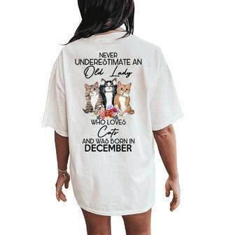 Never Underestimate An Old Lady Who Loves Cats December Women's Oversized Comfort T-Shirt Back Print - Seseable