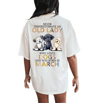 Never Underestimate Old Lady Loves Dogs Born In March Women's Oversized Comfort T-Shirt Back Print | Seseable CA