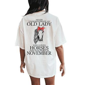 Never Underestimate An Old Lady Who Loves Horses November Women's Oversized Comfort T-Shirt Back Print - Seseable
