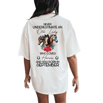 Never Underestimate An Old Lady Who Loves Horses September Women's Oversized Comfort T-Shirt Back Print | Mazezy