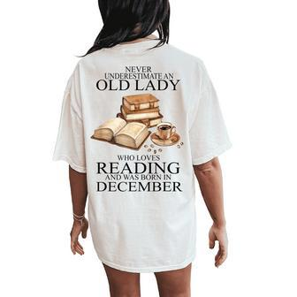 Never Underestimate An Old Lady Reading Born In December Women's Oversized Comfort T-Shirt Back Print | Mazezy