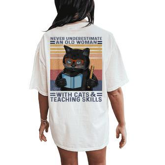Never Underestimate An Old Woman With Cats & Teaching Skills Women's Oversized Comfort T-Shirt Back Print - Thegiftio UK