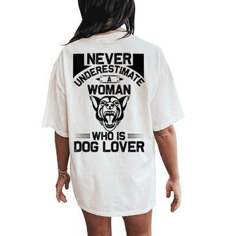 Never Underestimate A Woman Who Is A Dog Lover Dog Women's Oversized Comfort T-Shirt Back Print - Seseable