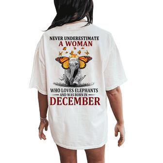 Never Underestimate A Woman Who Loves Elephants December Women's Oversized Comfort T-Shirt Back Print - Thegiftio UK
