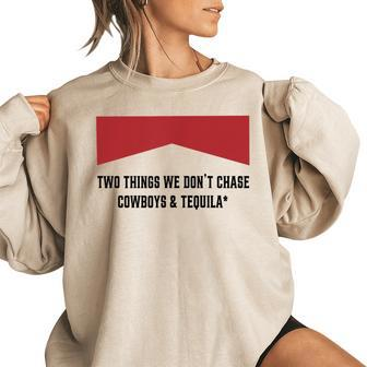Two Things We Dont Chase Cowboys And Tequila Funny Women Oversized Sweatshirt | Mazezy