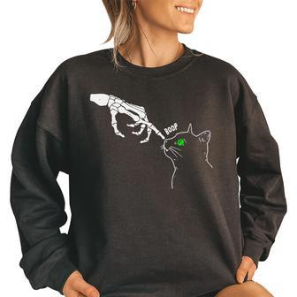 Skeleton Hand Boop On A Cats Nose Funny Halloween Graphic Women Oversized Sweatshirt | Mazezy