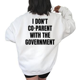 I Don’T Co-Parent With The Government Government Gifts Women's Oversized Back Print Sweatshirt | Mazezy