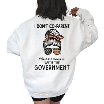 I Dont Co-Parent With The Government Messy American Mom Gifts For Mom Funny Gifts Women's Oversized Back Print Sweatshirt | Mazezy