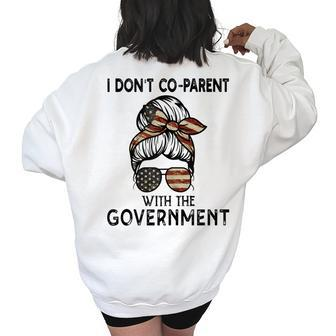 I Dont Co-Parent With The Government Messy Buns Mom Gifts For Mom Funny Gifts Women's Oversized Back Print Sweatshirt | Mazezy