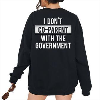 I Don’T Co-Parent With The Government Saying Government Women's Oversized Sweatshirt Back Print | Mazezy