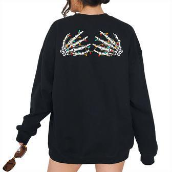 Skeleton Hand On Chest Christmas Lights Ornament Boobs Women Oversized Sweatshirt Back Print | Mazezy