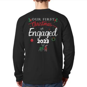 Our First Christmas Engaged 2023 Pajamas Couples Matching Back Print Long Sleeve T-shirt | Mazezy