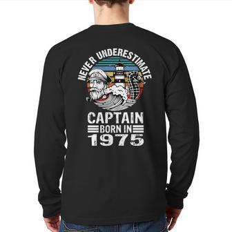 Never Underestimate Captain Born In 1975 Captain Sailing Back Print Long Sleeve T-shirt | Mazezy