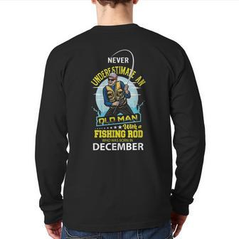 Never Underestimate Old Man With A Fishing Rod Born In Dec Back Print Long Sleeve T-shirt - Seseable