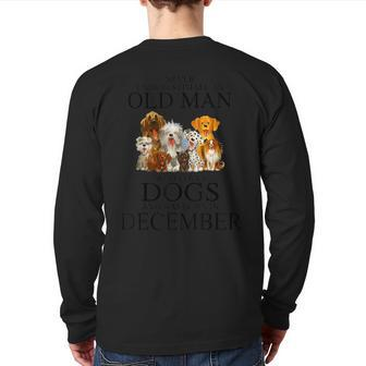 Never Underestimate An Old Man Who Loves Dogs In December Back Print Long Sleeve T-shirt - Seseable