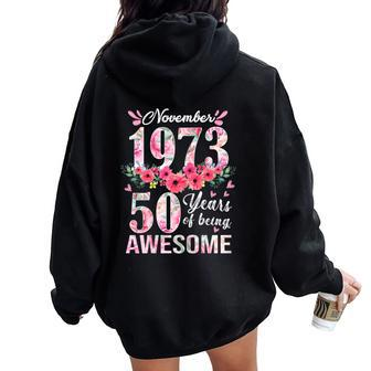 50 Year Old Made In November 1973 Floral 50Th Birthday Women Oversized Hoodie Back Print - Thegiftio UK