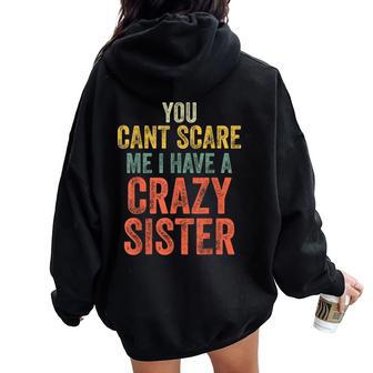 You Can't Scare Me I Have A Crazy Sister Brother Joke Women Oversized Hoodie Back Print | Mazezy