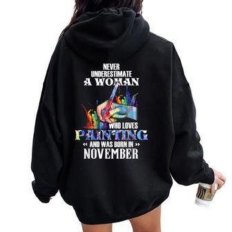 For November Guy Never Underestimate A Woman Who Loves Women Oversized Hoodie Back Print - Seseable