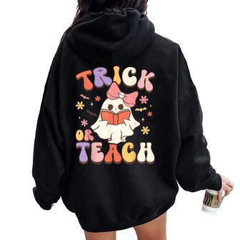Halloween Teacher Trick Or Teach Groovy Floral Ghost Teacher Women Oversized Hoodie Back Print | Mazezy