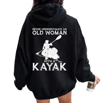 Kayaking Never Underestimate An Old Woman With A Kayak Women Oversized Hoodie Back Print - Monsterry UK