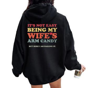 Not Easy Being My Wife's Arm Candy But Here I Am Nailing It Women Oversized Hoodie Back Print - Thegiftio UK