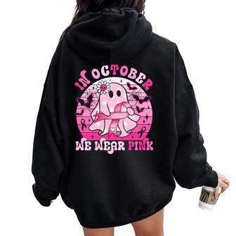 In October We Wear Pink Breast Cancer Groovy Ghost Halloween Women Oversized Hoodie Back Print - Seseable