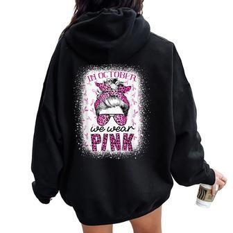 In October We Wear Pink Messy Bun Pink Leopard Breast Cancer Women Oversized Hoodie Back Print - Seseable