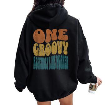 One Groovy Assembly Line Worker Front Line Worker Women Oversized Hoodie Back Print | Mazezy