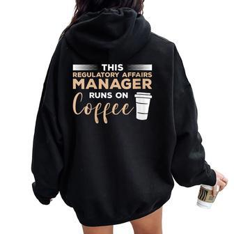 This Regulatory Affairs Manager Runs On Coffee Women Oversized Hoodie Back Print | Mazezy