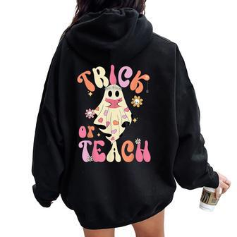 Trick Or Teach Retro Floral Groovy Ghost Teacher Halloween Women Oversized Hoodie Back Print - Thegiftio UK