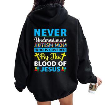 Never Underestimate Autism Mom Covered With Blood Of Jesus Women Oversized Hoodie Back Print - Seseable