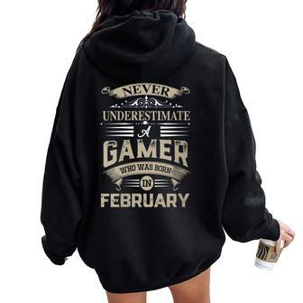 Never Underestimate A Gamer Who Was Born In February Women Oversized Hoodie Back Print - Seseable