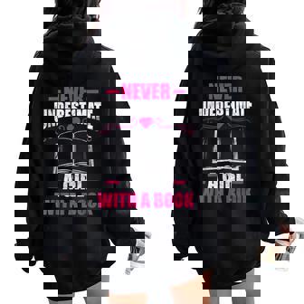 Never Underestimate A Girl With A Book Book Nerd Women Oversized Hoodie Back Print | Mazezy