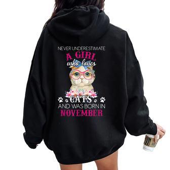 Never Underestimate A Girl Who Loves Cats Was Born November Women Oversized Hoodie Back Print - Seseable