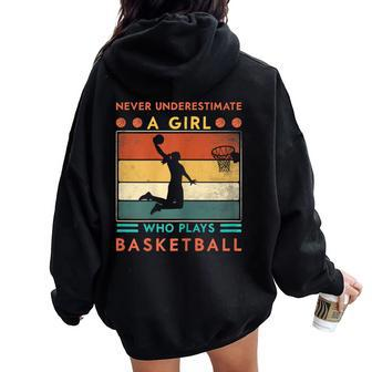 Never Underestimate A Girl Who Plays Basketball Girls Women Oversized Hoodie Back Print | Mazezy