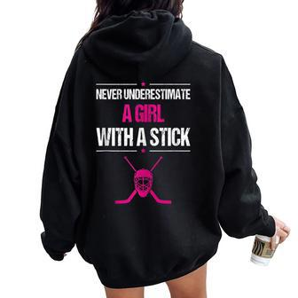 Never Underestimate A Girl With A Stick Hockey Women Oversized Hoodie Back Print | Mazezy