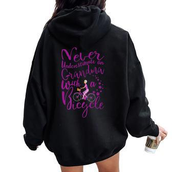 Never Underestimate A Grandma With A Bicycle Cool T Women Oversized Hoodie Back Print - Seseable