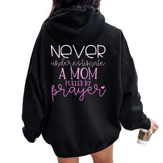 Never Underestimate A Mom Fueled By Prayer On Women Oversized Hoodie Back Print | Mazezy